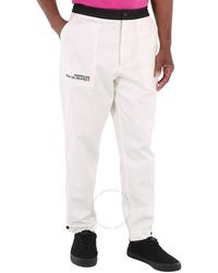 Moncler - Logo Embroidered Cotton Tapered Trousers, Brand Size 48 (Us - Lyst