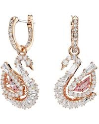 Swarovski - Rose-Tone Plated Swan Drop Earrings - Lyst