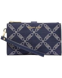Michael Kors - Logo Jacquard Adele Empire Smartphone Wallet - Lyst