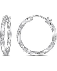 Amour - 1/4 Ct Tw Diamond Twisted Hoop Earrings - Lyst
