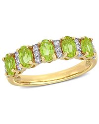 Amour - 1 1/ Ct Tgw Peridot And 1/6 Ct Tw Diamond Semi Eternity Ring - Lyst