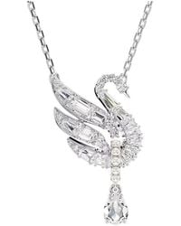 Swarovski - Rhodium Plated Swan Pendant Necklace - Lyst