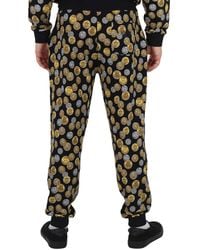 Moschino - Coin Print Stretch Cotton Track Pants - Lyst