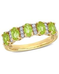 Amour - 1 1/ Ct Tgw Peridot And 1/6 Ct Tw Diamond Semi Eternity Ring - Lyst