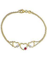 Created Forever - 1/6Ct Tgw Created Ruby And 1/7Ct Tw Lab-Grown Diamond Triple Heart Bracelet - Lyst