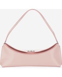 Jacquemus - Ovalo Leather Clutch Bag - Lyst