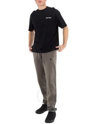 Marcelo Burlon - Marcel Burlon Cross Logo Print Cotton Track Pants - Lyst