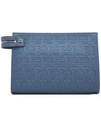 Ferragamo - Gancini Embossed Travel Clutch - Lyst