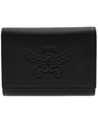 MCM - Embossed Logo Small Himmel Trifold Wallet - Lyst