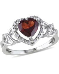 Amour - 1/10 Ct Tw Diamond And Garnet Open Heart Crossover Ring - Lyst