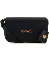 Versace - Tag Foldover Top Mini Shoulder Bag - Lyst