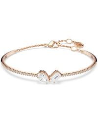 Swarovski - Mesmera Rose-Tone Plated Mixed Cuts Bangle - Lyst