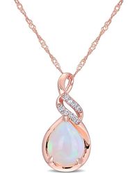 Amour - 2 Ct Tgw Ethiopian-Opal And Diamond-Accent Twist Pendant With Chain - Lyst
