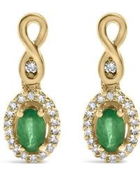 Haus of Brilliance - 10K Oval Cut Emerald 5X3 Mm And 1/7 Cttw Round Diamond Dangle Earrings - Lyst