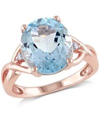 Amour - 5 1/2 Ct Tgw Oval Topaz And Diamond Twist Split Shank Cocktail Ring - Lyst