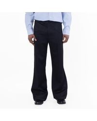 Amiri - Creased Flare Wool Pants - Lyst