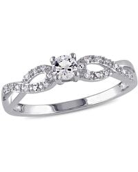 Amour - 1/10 Ct Tw Diamond And Created Sapphire Infinity Ring - Lyst