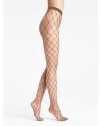 Wolford - Sixties Fishnet Tights - Lyst