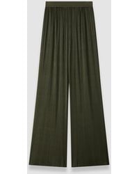 JOSEPH - Amber Pleated Satin Trousers - Lyst
