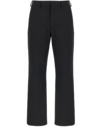 Prada - Stretch Techno Pants - Lyst