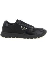 Prada - Low-Top Sneaker With Enameled Triangle Logo - Lyst