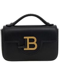 Balmain - Borsa a o mini 'b-buzz' con dettaglio logo b in pelle liscia nera - Lyst