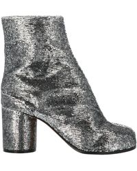 maison margiela holographic boots