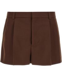 Gucci - Logo-Embossed Tailored Wool-Twill Shorts - Lyst