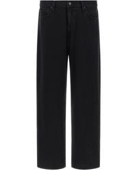 Carhartt - Denim Trousers With Tonal Logo Patch - Lyst