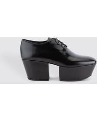 prada black platform shoes