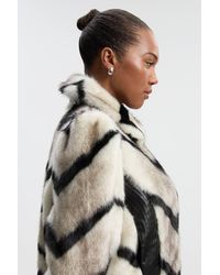 Karen Millen - Plus Size Faux Fur Pu Panelled Stripe Belted Cropped Jacket - Lyst
