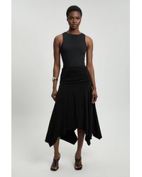 Karen Millen - Stretch Drapey Crepe Ruched Hanky Hem Midi Skirt - Lyst