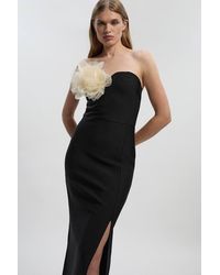 Karen Millen - Figure Form Bandage Rosette Knit Midi Dress - Lyst