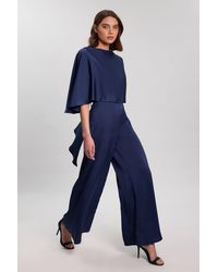 Karen Millen - Satin Back Crepe Cape Detail Woven Jumpsuit - Lyst