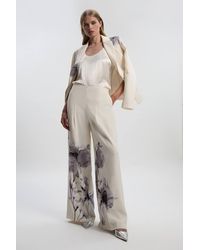 Karen Millen - Floral Placement Print Tailored Crepe Pleat Detail Wide Leg Trousers - Lyst