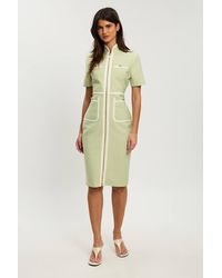 Karen Millen - Petite Figure Form Bandage Knit Piping Detail Short Sleeve Military Midi Dress - Lyst