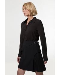 Karen Millen - Tailored Buckle Detail Pleated Mini Skirt - Lyst