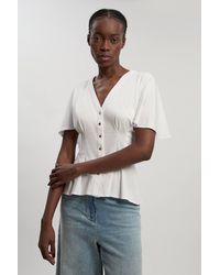Karen Millen - Jersey V Neck Button Detail T - Lyst