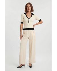 Karen Millen - Petite Knit Rib With Contrast Hem Detail Collared Short Sleeve Top - Lyst