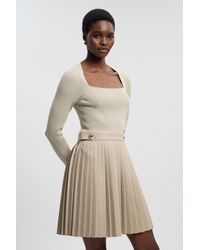 Karen Millen - Viscose Rib Pu Mix Tab Detail Pleated Knit Mini Dress - Lyst