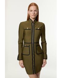Karen Millen - Figure Form Bandage Knit Piping Detail Military Dress - Lyst