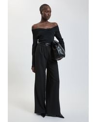 Karen Millen - Twist Front Viscose Knitted Bardot Top - Lyst