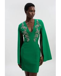 Karen Millen - Bandage Form Fitting Cape Sleeve Embellished Mini Dress - Lyst