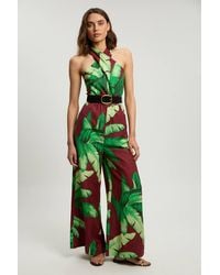 Karen Millen - Viscose Linen Palm Tree Belted Halterneck Woven Jumpsuit - Lyst
