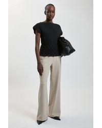 Karen Millen - Ribbed Knit Power Shoulder Top With Manipulated Stitch Detail - Lyst