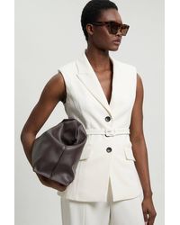 Karen Millen - Petite Tailored Structured Crepe Belted Sleeveless Blazer - Lyst