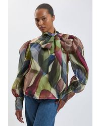 Karen Millen - Plus Size Petal Print Organza Pussybow Blouse - Lyst