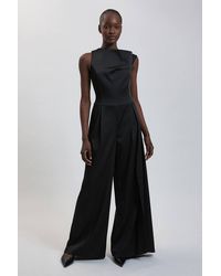 Karen Millen - Tailored Satin Drape Asymmetric Jumpsuit - Lyst