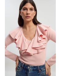 Karen Millen - Compact Wool Look Ruffle V Neck Knit Top - Lyst