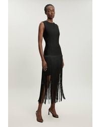 Karen Millen - Figure Form Bandage Tassel Hem Knitted Dress - Lyst